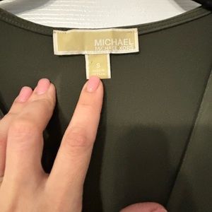 Green long sleeve jersey material dress.